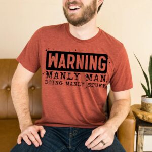 Warning Manly Man Doing Manly Stuff